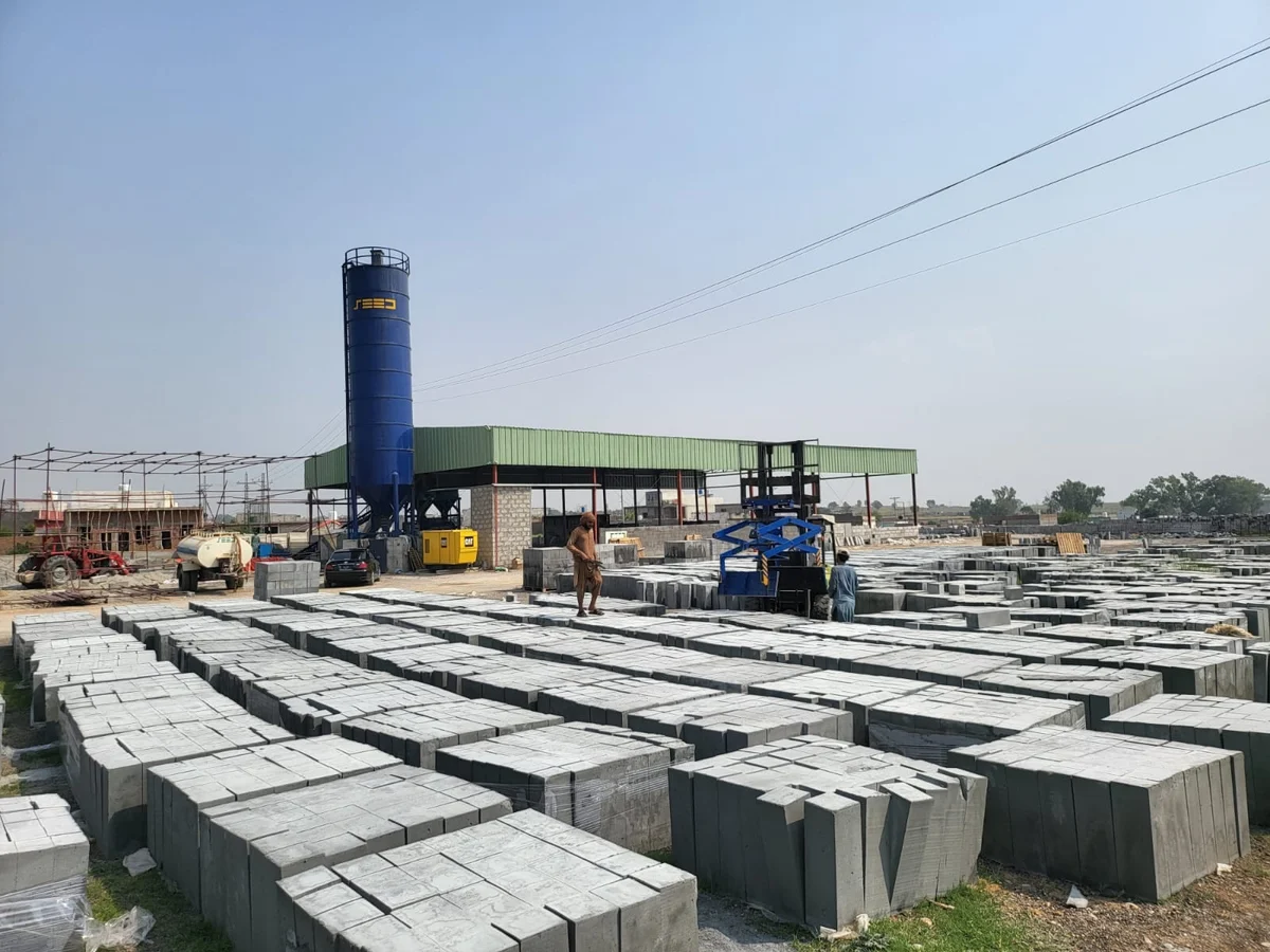 Concrete block production yard with SEED plant and silo