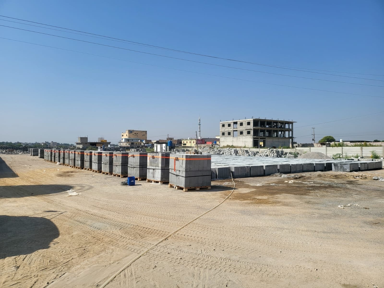 Cured CLC blocks staged in the yard