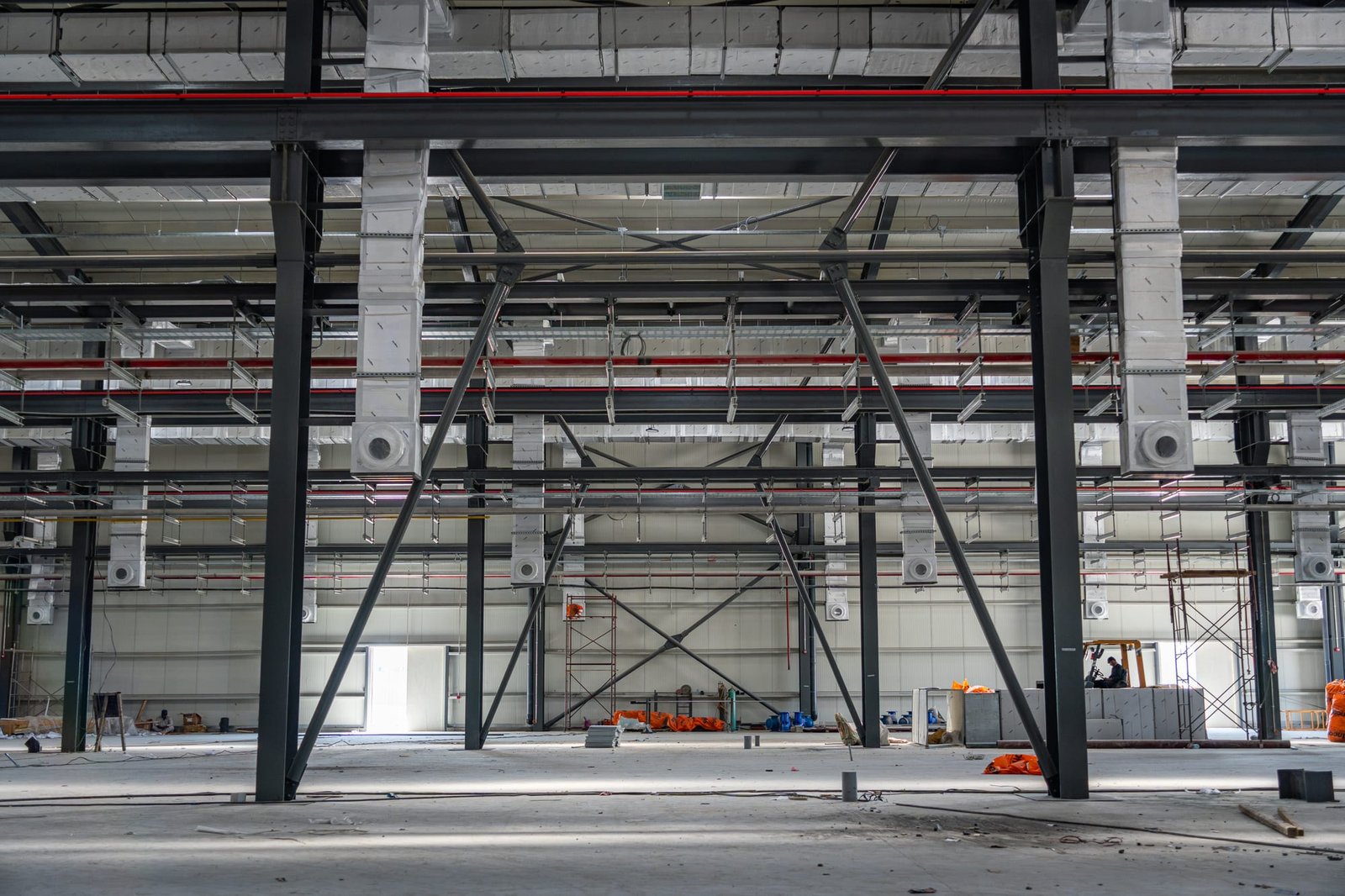 Completed structural steel frame inside the production hall